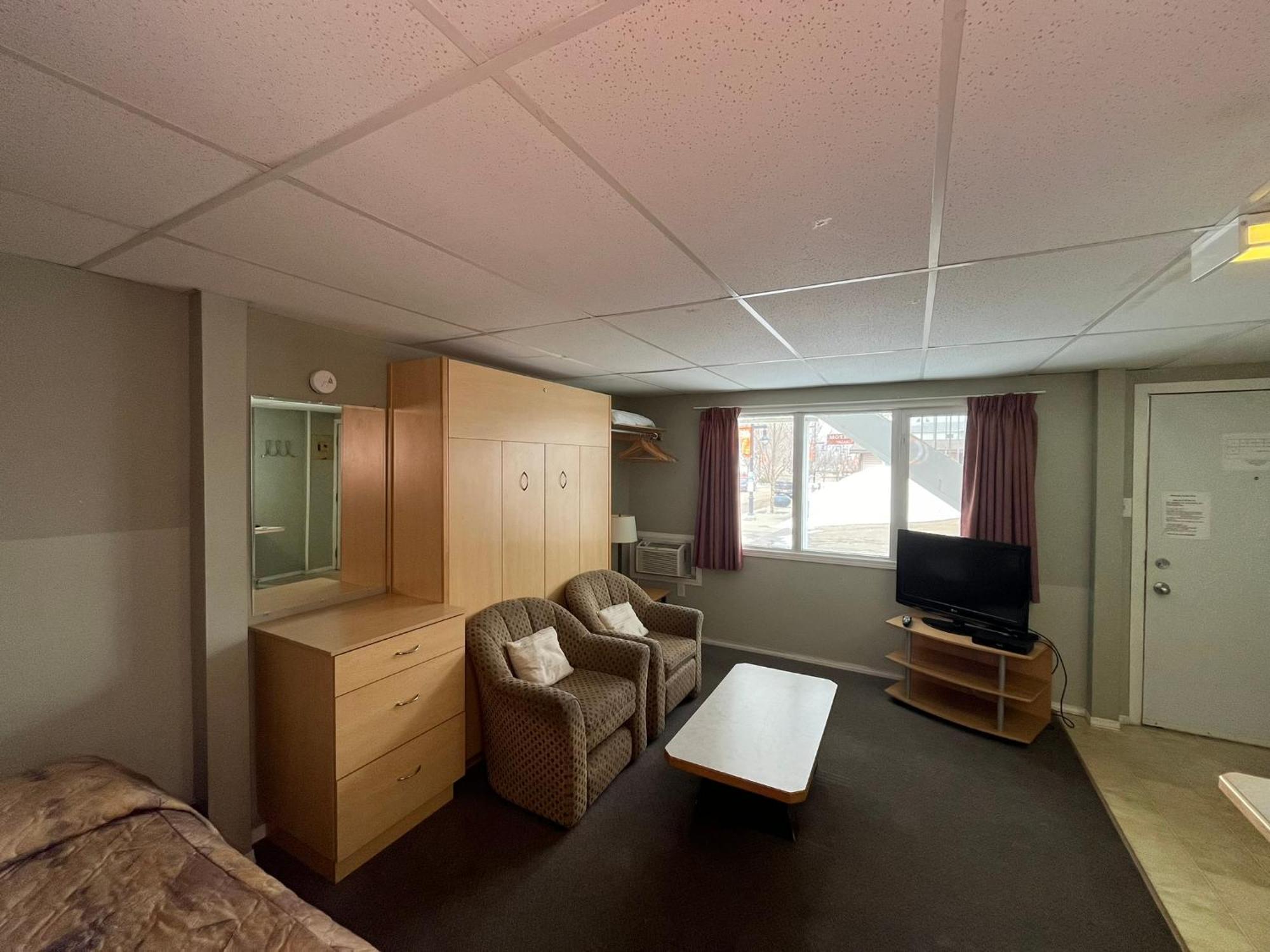 Raccoon Lodge Motel Sylvan Lake Pokoj fotografie