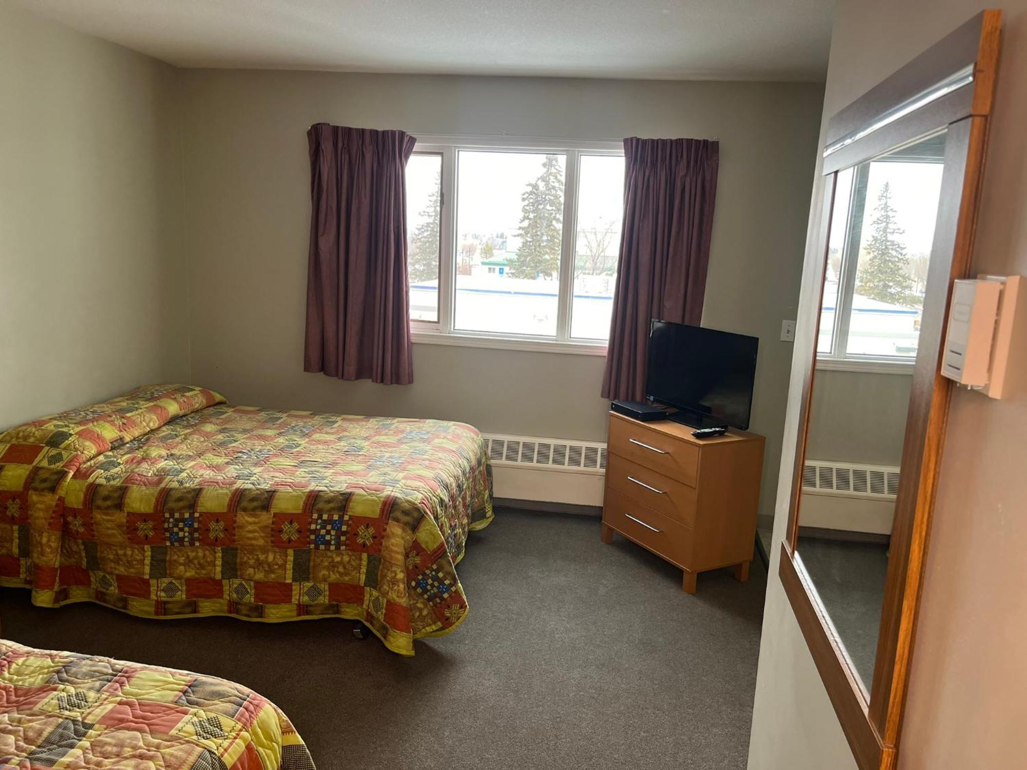 Raccoon Lodge Motel Sylvan Lake Pokoj fotografie